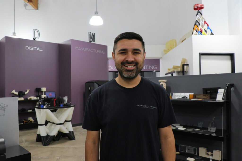 man smiling wearing black shirt